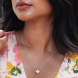 Model Wearing Small Flower Necklace with Pearl Centre in Silver