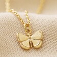 Close Up of Pendant on Tiny Butterfly Pendant Necklace in Gold