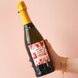 Model Holding Bottle of Personalised Love is Love Prosecco