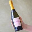 Model Holding Bottle of Personalised Vintage Pink Nana Prosecco