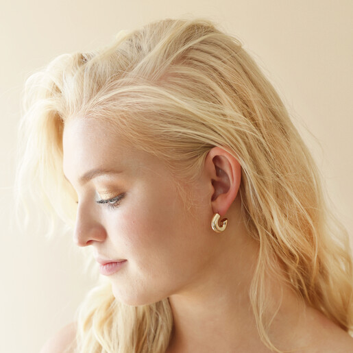 Model Wearing Gold Hoop Earrings in Gold on Model