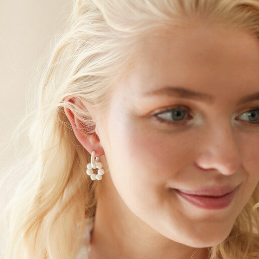 Big Metal London Pearl Daisy Hoop Earrings in Silver on Model