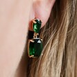 Close Up of Model Wearing Statement Gemstone Drop Earrings in Green