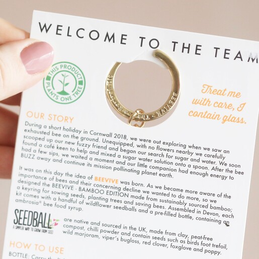 back of packaging of Beevive Bamboo Bee Revival Kit Keyring in Gold