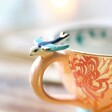 Close up of House of Disaster Luxe Swallow Mug on Table
