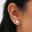 Estella Bartlett Silver Pearl Buttercup Stud Earrings on model