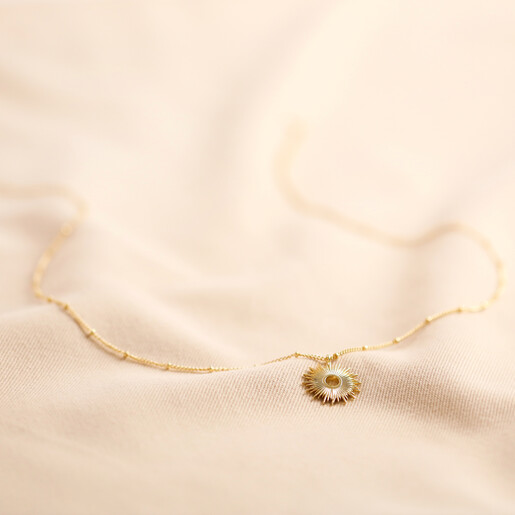 full length shot of Estella Bartlett Full Sunburst Necklace in Gold