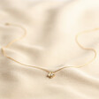 Full Length Shot of Estella Bartlett Gold Pearl Buttercup Necklace