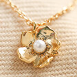 Close up of Estella Bartlett Gold Pearl Buttercup Necklace