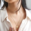 model wearing Estella Bartlett Full Sunburst Necklace in Gold