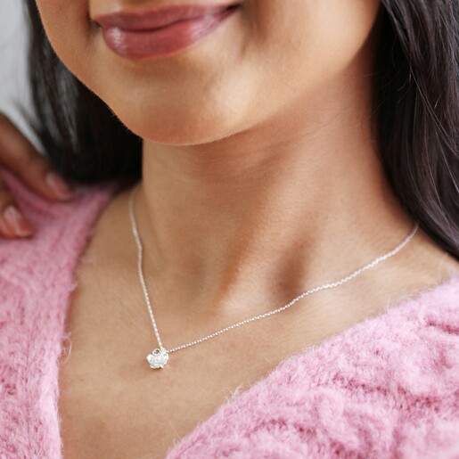 Model wearing Estella Bartlett Silver Pearl Buttercup Necklace