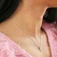 Model wearing Estella Bartlett Tiny Key Pendant Necklace