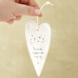 Model holding up Brightest Star Hanging Heart Decoration