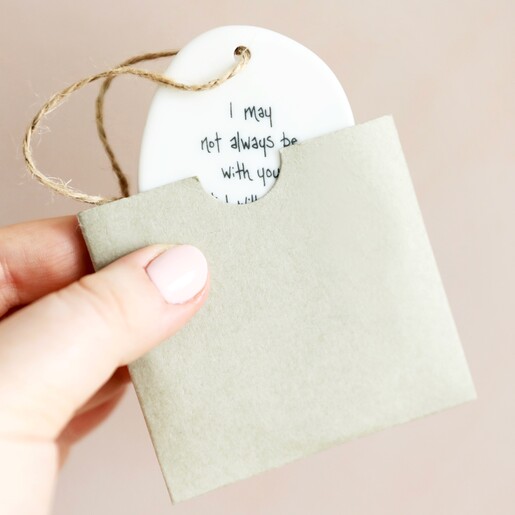 Model Holding East of India Sgraffito There For You Hanging Decoration in Packaging