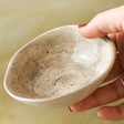 model holding East of India Organic Shaped Trinket Bowl