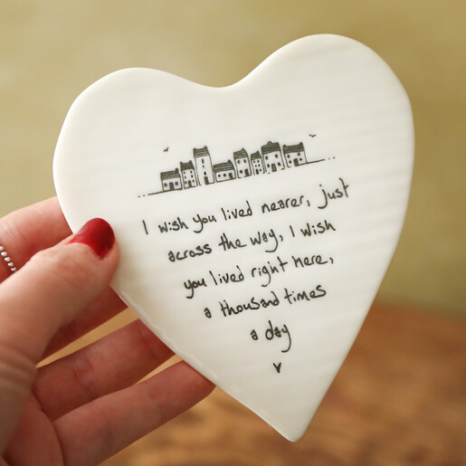 model holding East of India Wish You Lived Nearer Heart Coaster