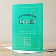 Cheers Dad Card on Wooden Table