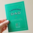 Model Holding Cheers Dad Card
