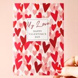 Model Holding Happy Valentine’s Day Hearts Card