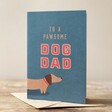 To a Pawsome Dog Dad Card on Wood Table