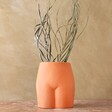 Front of Terracotta Speckled Bum Vase with Dried Grass