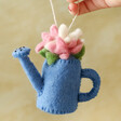 model holding Felt Blossoming Watering Can Hanging Decoration by string