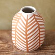 Terracotta Chevron Vase Close-up on Wooden Table