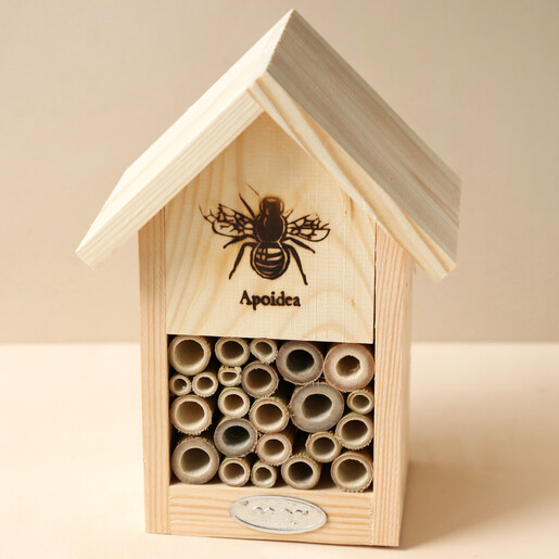 Wooden Bee House Against Natural Coloured Background