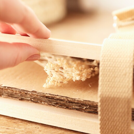 Close Up of Wooden Flower and Herb Press