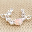 Close-up of Crystal and Opal Horseshoe Bracelet in Silver