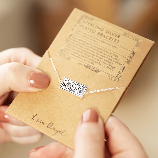Model Holding Silver The Moon Tarot Card Bracelet on Card