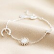 Sun and Moon Chain Bracelet in Silver on neutral fabric