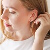 Clear and Blue Crystal Moon Stud Earrings in Gold on Model