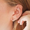 Model Wearing Clear and Blue Crystal Moon Stud Earrings in Gold Close Up
