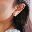 Close Up of Model Wearing Double Half Pearl Stud Earrings in Silver