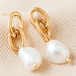 Gold Stainless Steel Chain and Pearl Drop Earrings on Fabric