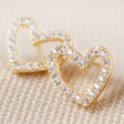 Irregular Heart Crystal Stud Earrings in Gold on Fabric
