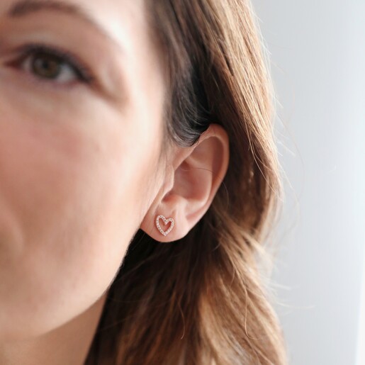 Model Wearing Irregular Crystal Heart Stud Earrings in Rose Gold