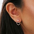 close up of model wearing drop earring from Mismatched Crystal Heart Earrings in Rose Gold