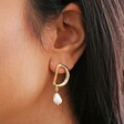 Close Up of Organic Circle Pearl Drop Earrings in Gold