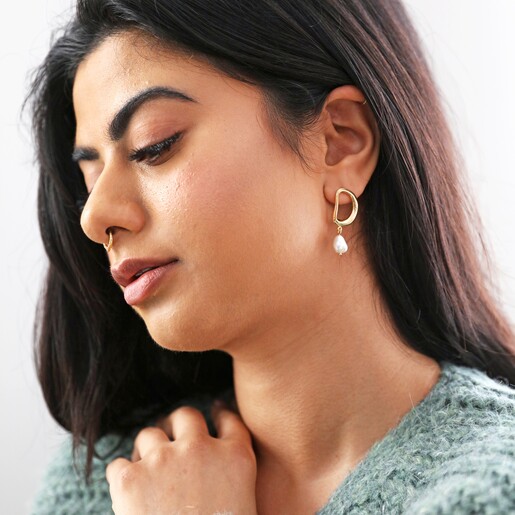 Model Wearing Organic Circle Pearl Drop Earrings