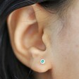 May Emerald Sterling Silver Birthstone Stud Earrings on Model