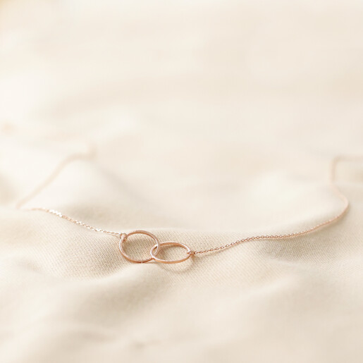 Full Brushed Interlocking Hoop Necklace in Rose Gold on Fabric