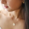 Model Wearing Enamel Birth Flower Necklace in Gold