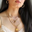 Gold Stainless Steel Coin Pendant Necklace Layered on Model