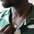 Gold Stainless Steel Coin Pendant Necklace on Male Model