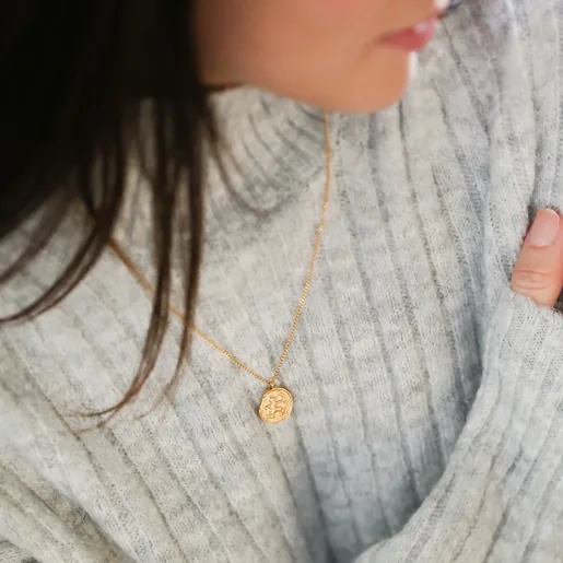 Model Wearing Polished Gold Stainless Steel Sagittarius Pendant Necklace