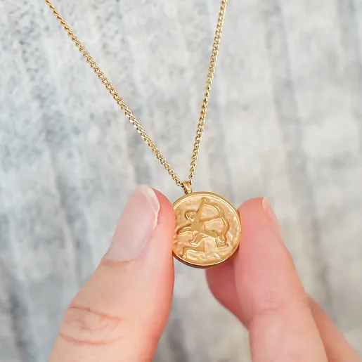 Model Wearing Gold Stainless Steel Sagittarius Pendant Necklace