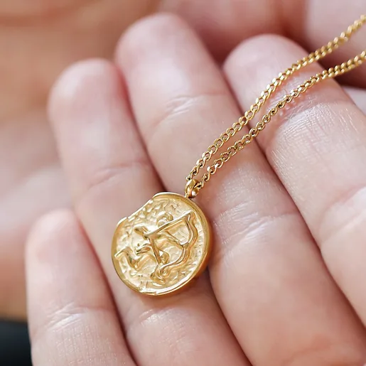 Model Holding Gold Stainless Steel Sagittarius Pendant Necklace