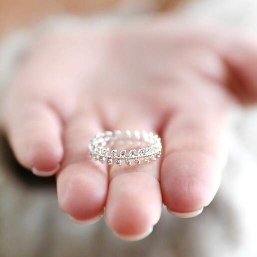 Model Holding Crystal Leaves Ring in Silver